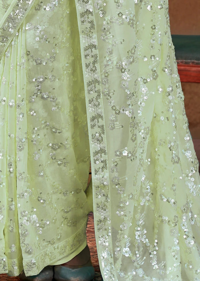 Pure Georgette Party Wear Pastel Green Sequins Floral Saree