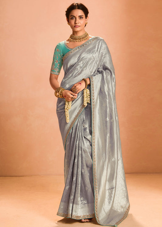 Pure Banarasi Tissue Silk Embroidered Silver Handloom Saree & Contrast Blue Blouse