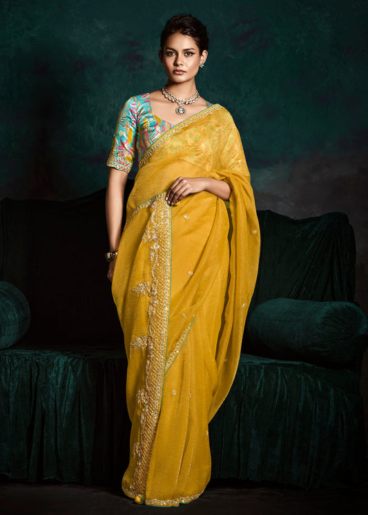 Yellow Embroidered Sheer Silk Saree With Contrast Blue Printed Blouse