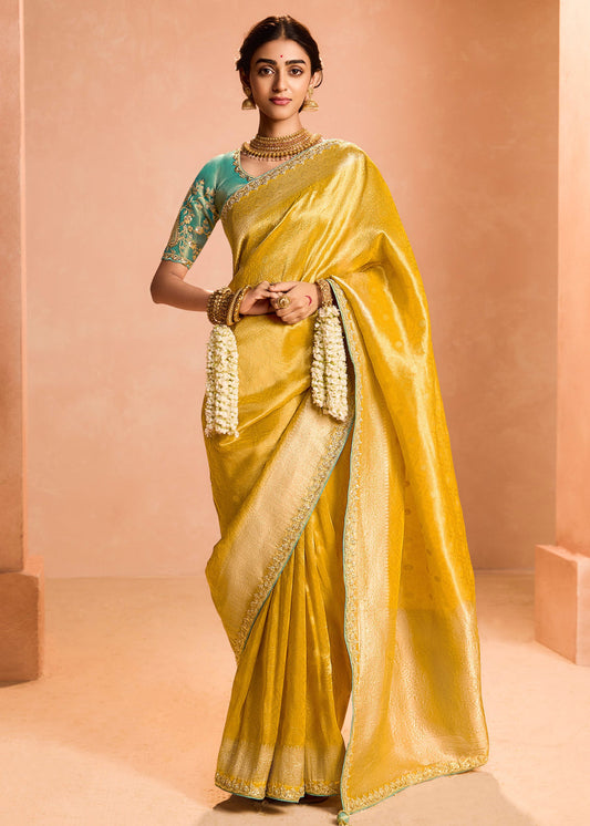 Pure Banarasi Tissue Silk Embroidered Yellow Handloom Saree & Contrast Blue Blouse