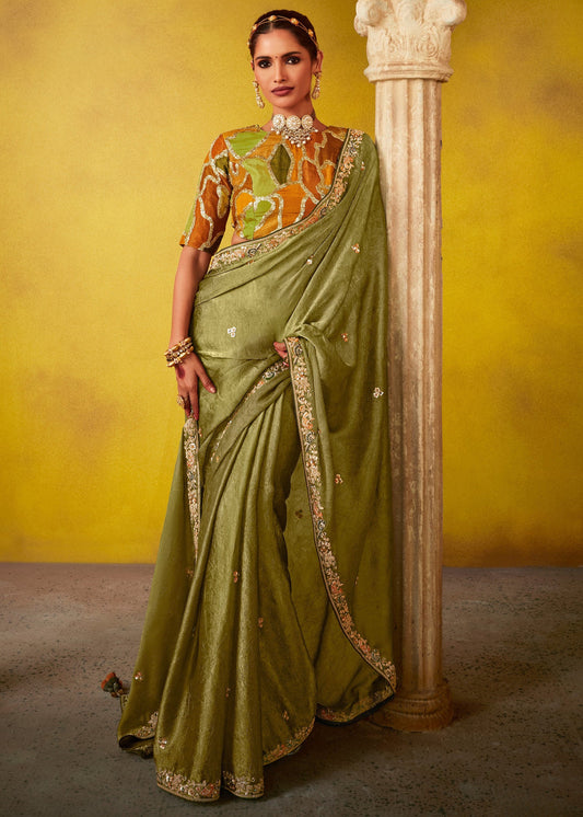 Moss Green Glass Tissue Silk Embroidered Saree & Printed Blouse