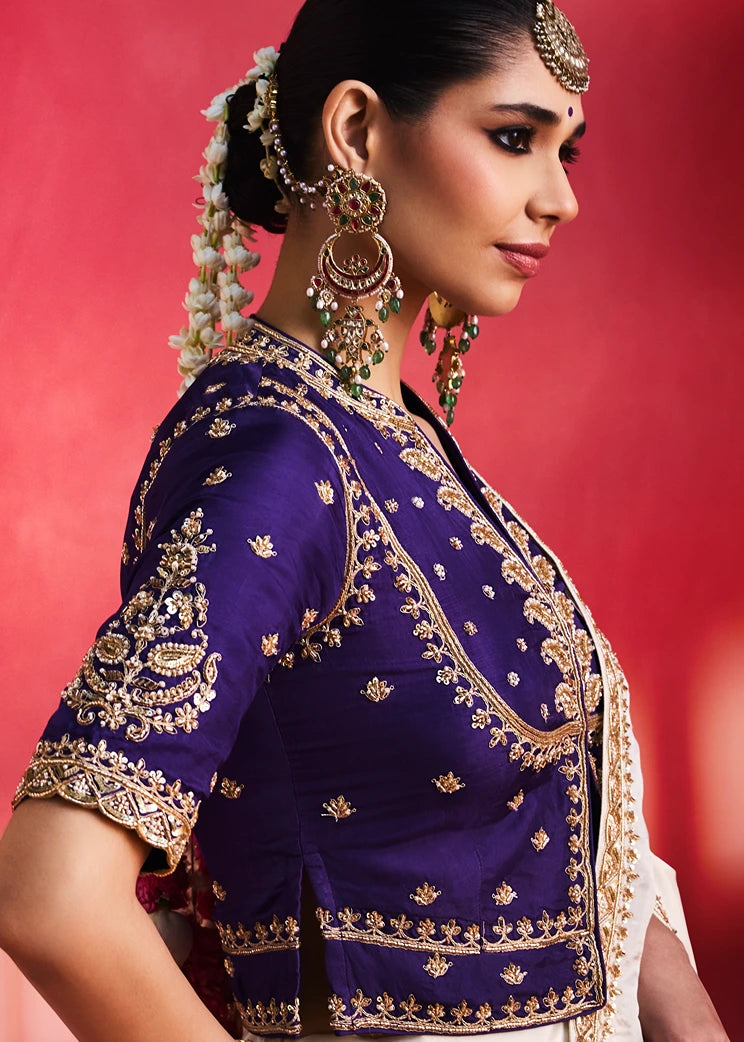 Off White Silk Embroidered Saree & Purple Blouse