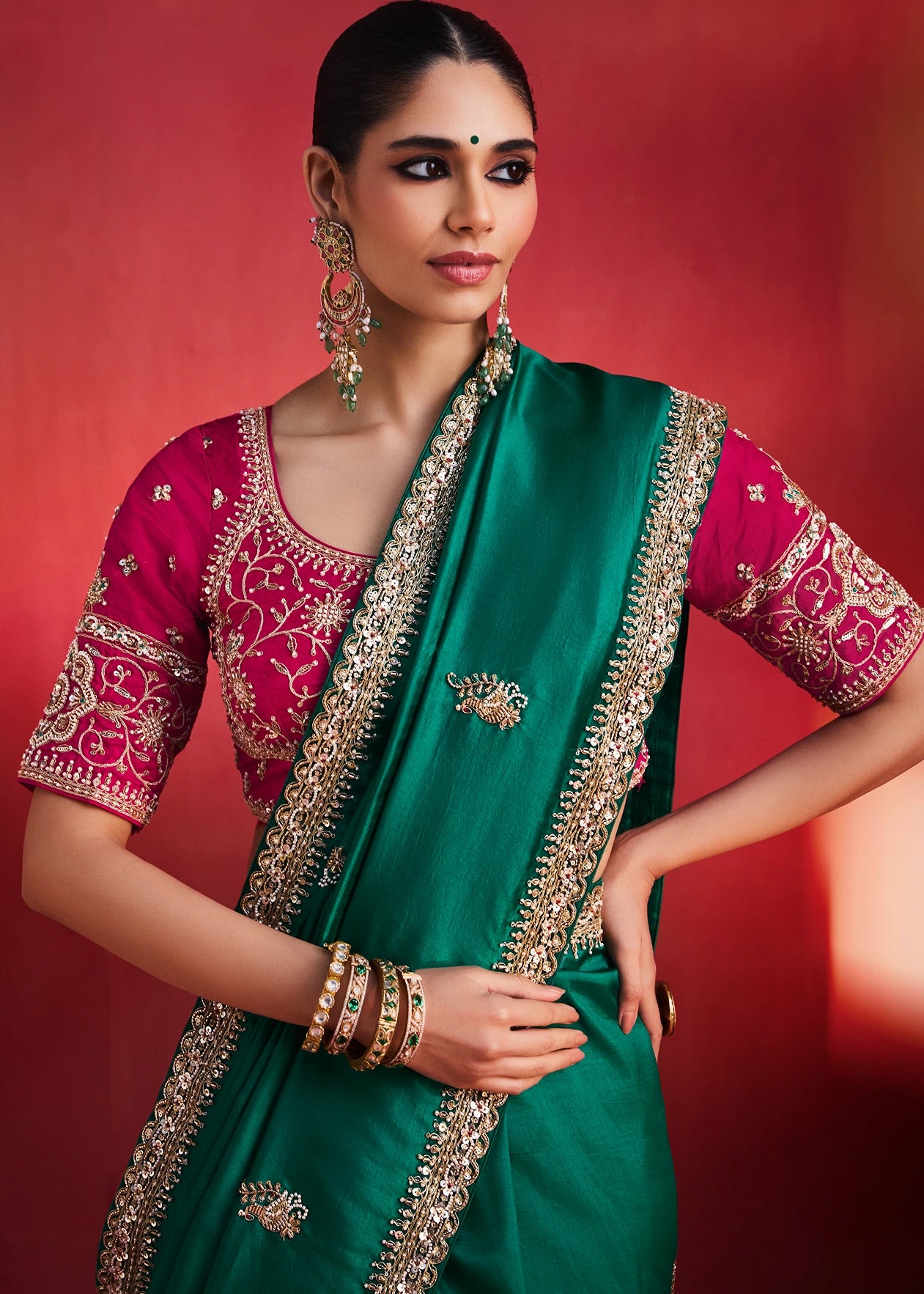 Green Silk Embroidered Saree & Red Blouse