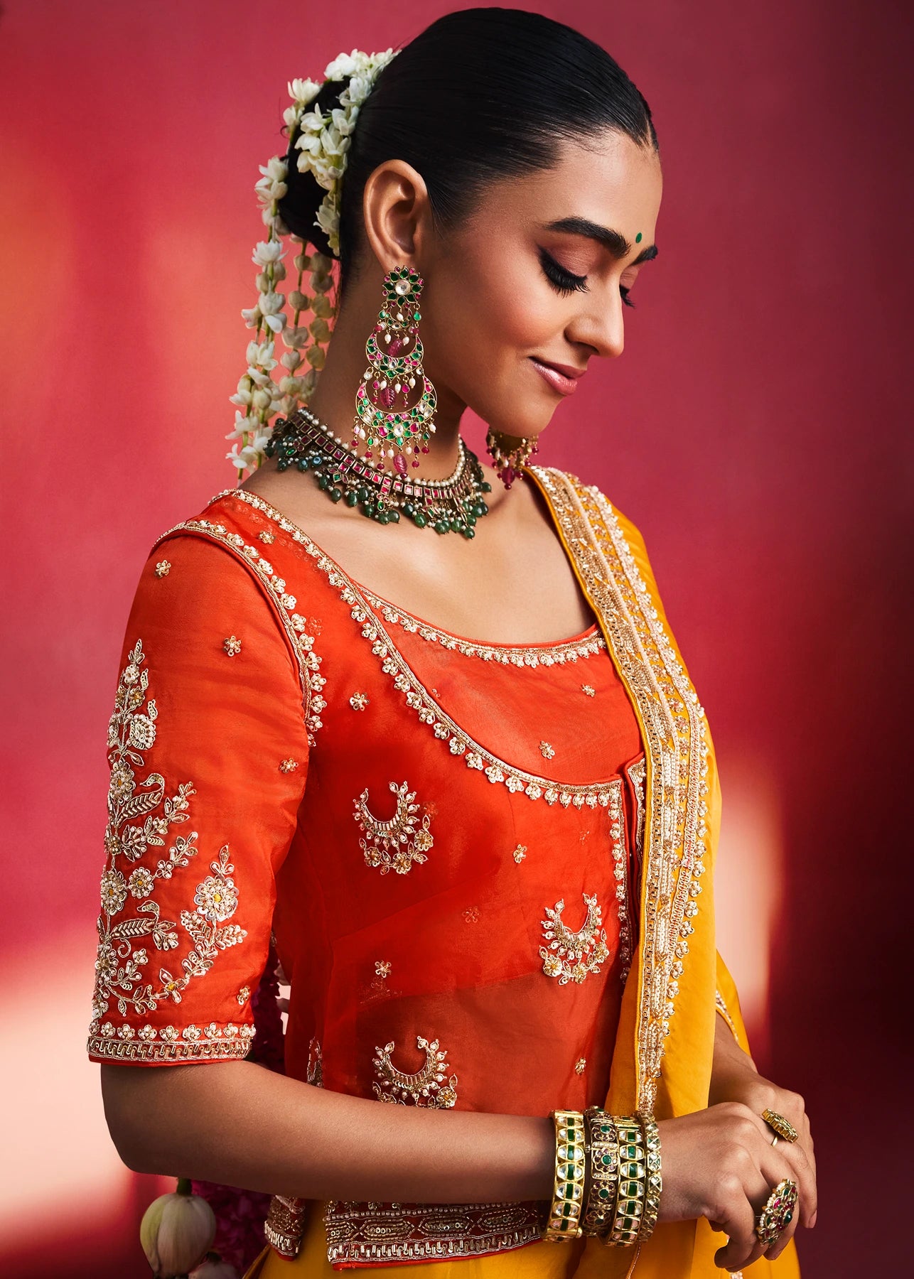 Yellow Silk Embroidered Saree With Orange Blouse