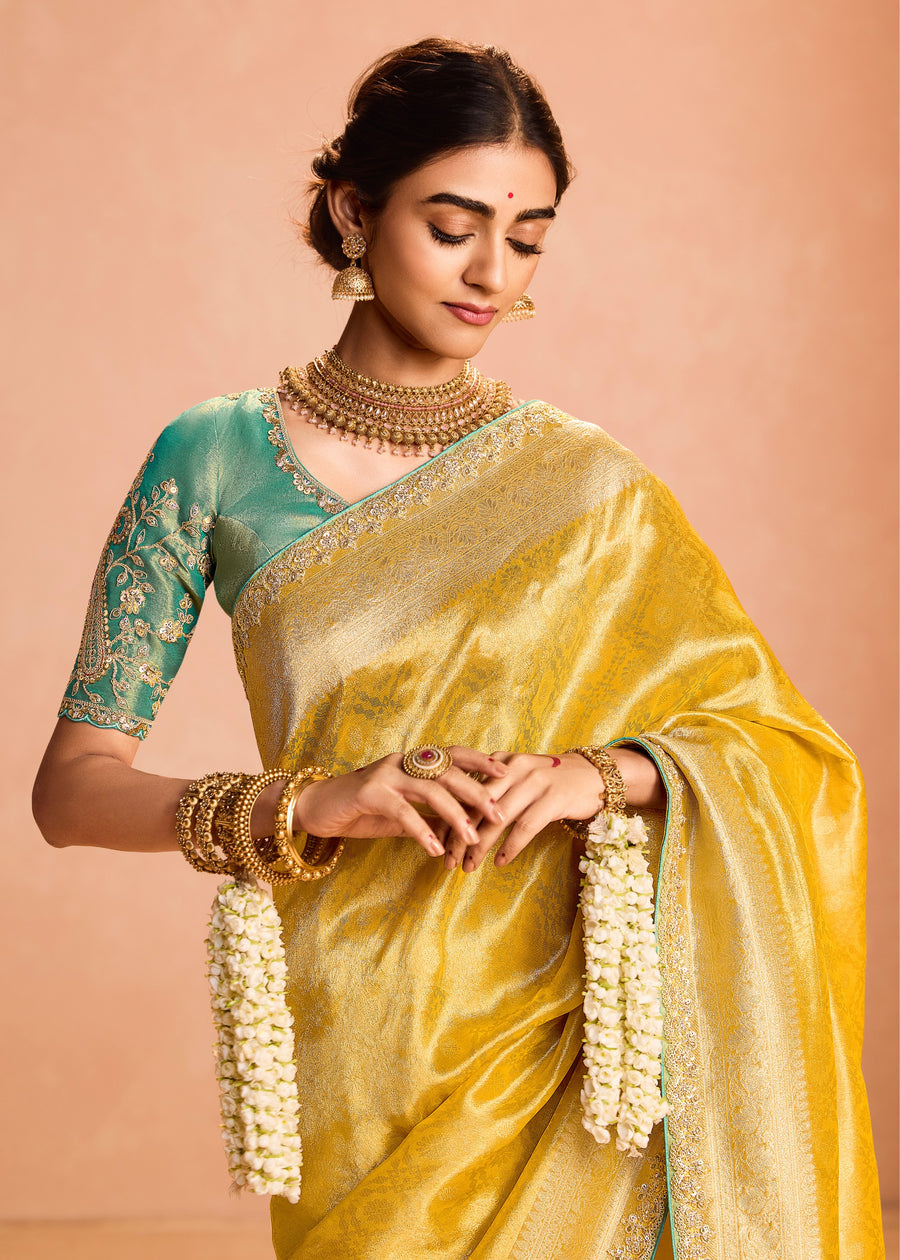 Pure Banarasi Tissue Silk Embroidered Yellow Handloom Saree & Contrast Blue Blouse