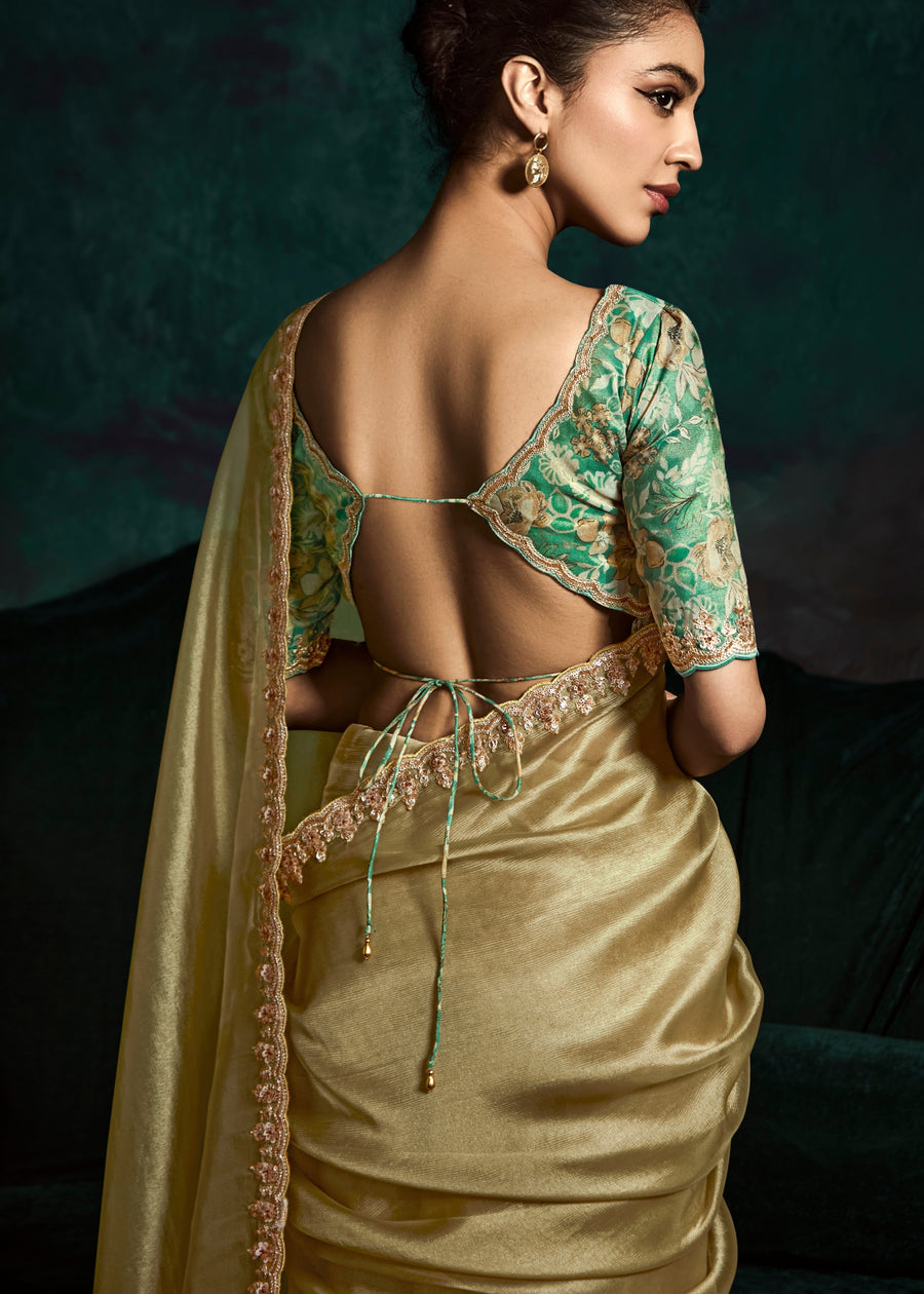 Golden Embroidered Sheer Silk Saree With Contrast Green Printed Blouse