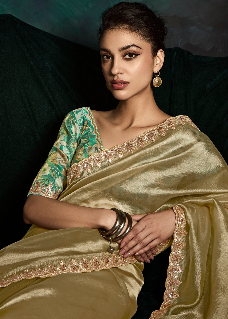 Golden Embroidered Sheer Silk Saree With Contrast Green Printed Blouse