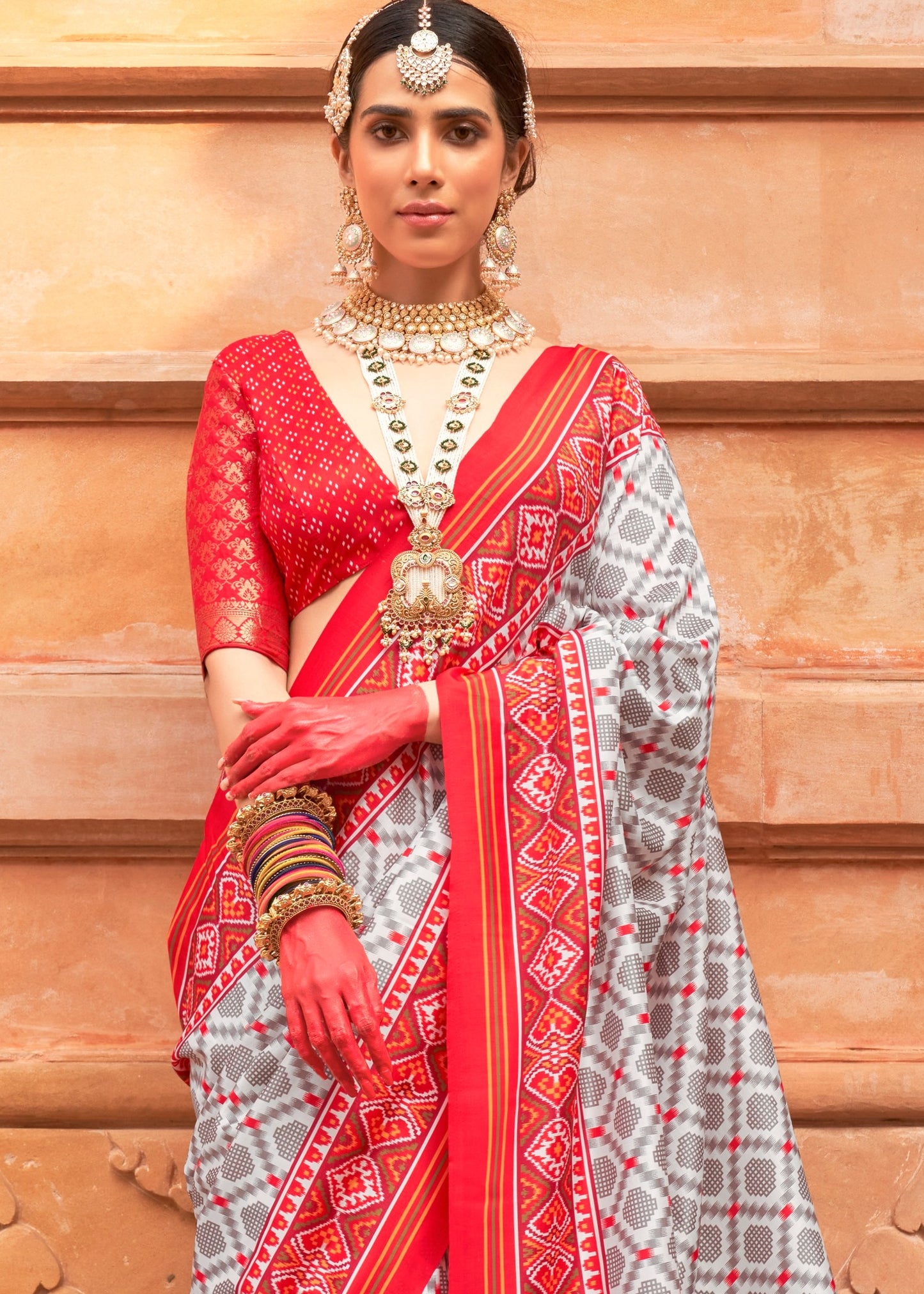 Light Grey and Red Patola Silk Saree