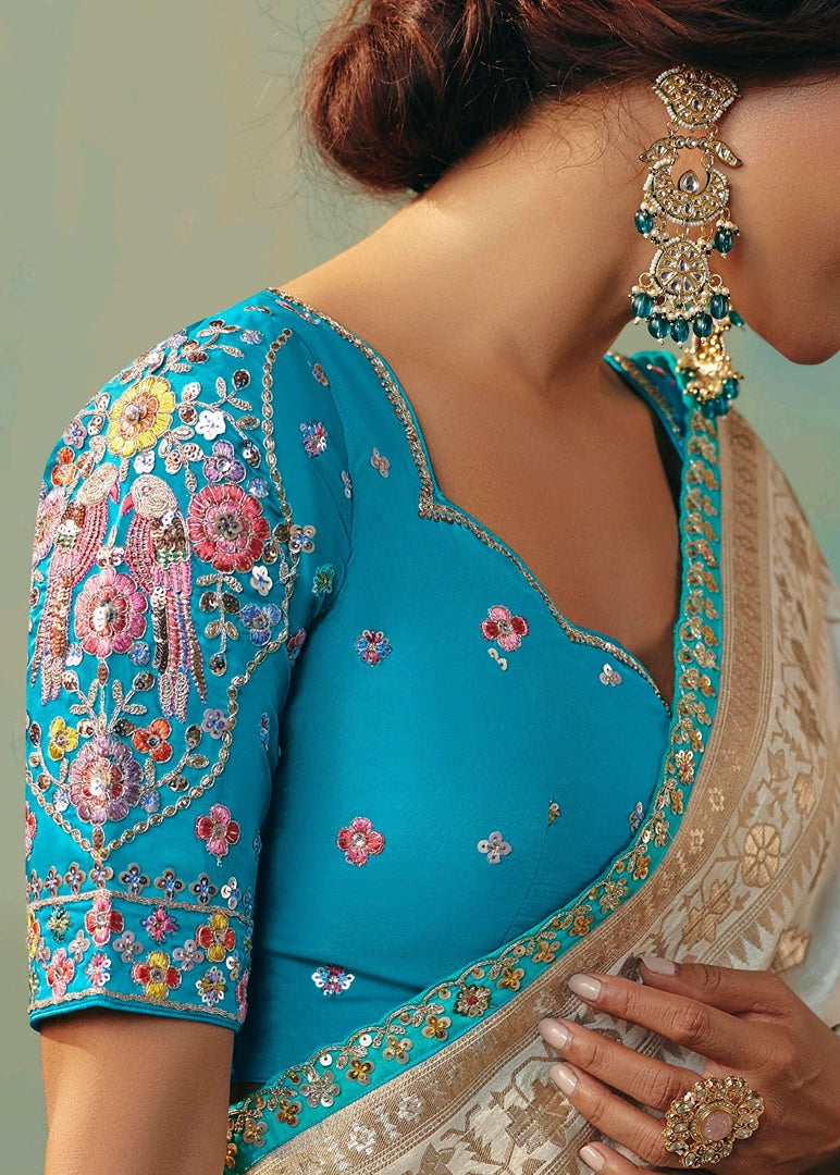 Off White Banarasi Silk Bridal Saree & Turquoise Blue Embroidered Blouse