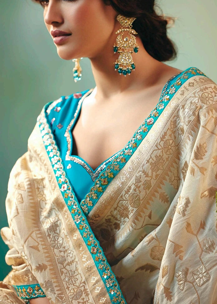 Off White Banarasi Silk Bridal Saree & Turquoise Blue Embroidered Blouse