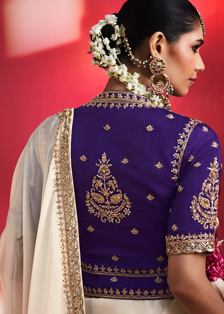 Off White Silk Embroidered Saree & Purple Blouse