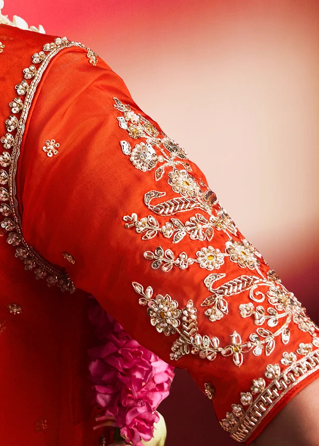 Yellow Silk Embroidered Saree With Orange Blouse