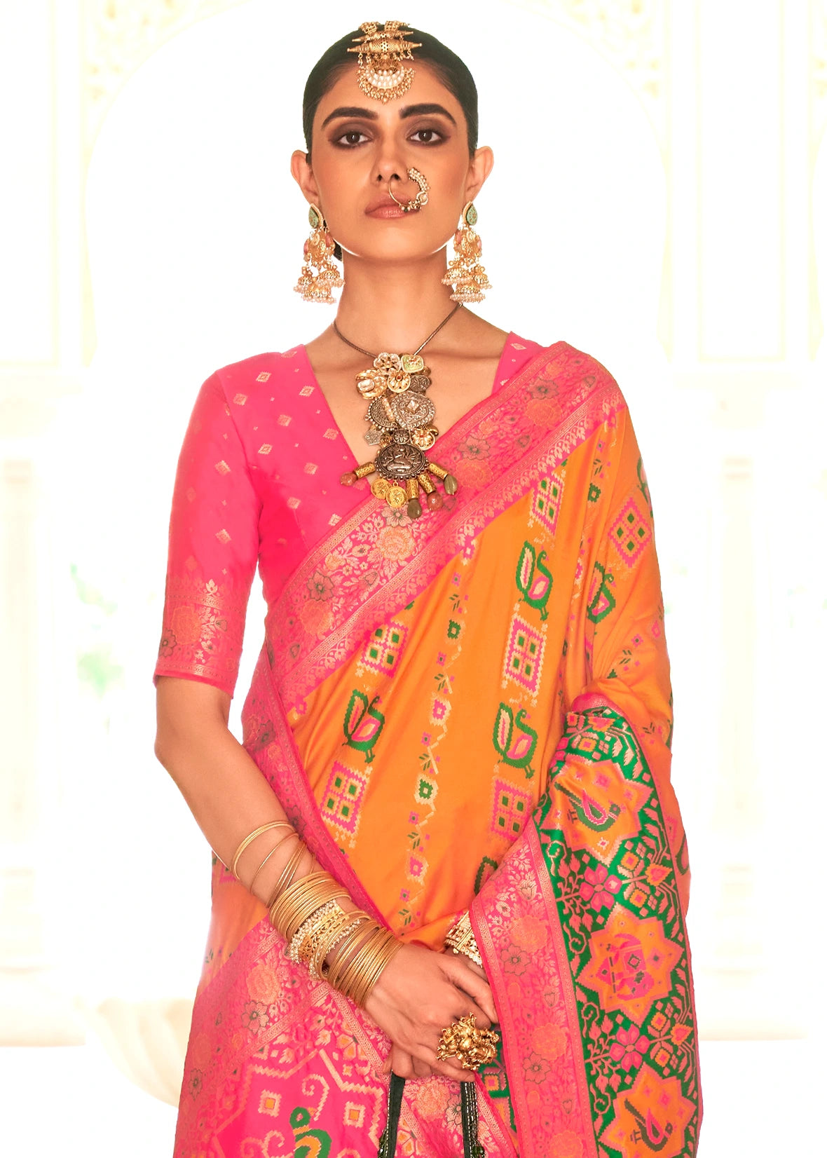 Mustard Yellow Patola Silk Saree With Pink Blouse