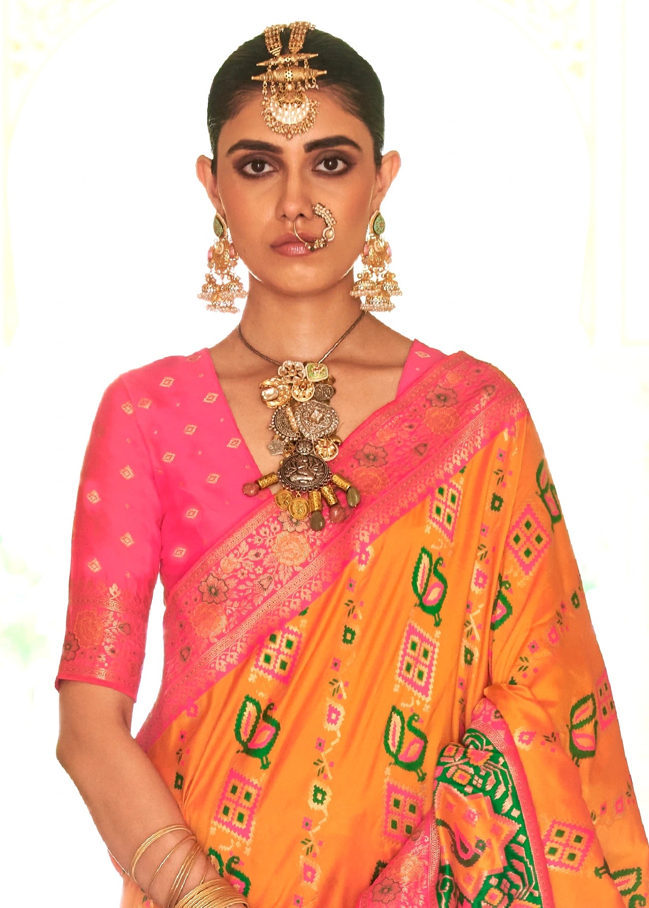 Mustard Yellow Patola Silk Saree With Pink Blouse