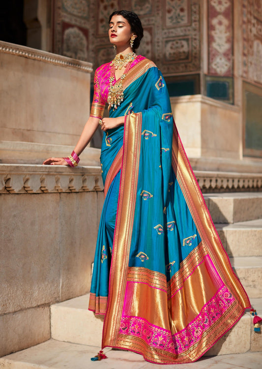 Woman's banarasi patola blue color silk saree with threadwork hand embroidery online shopping.