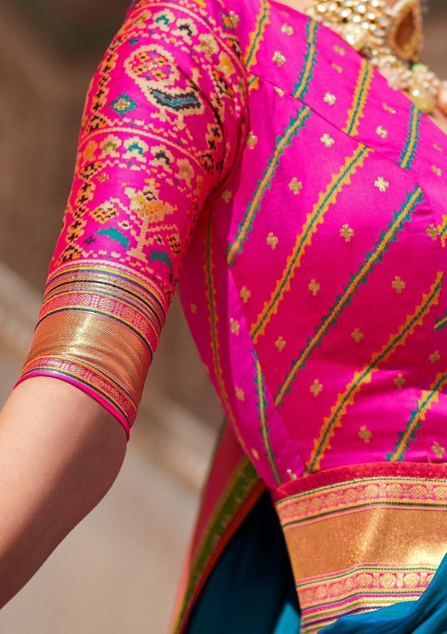Banarasi-Patola-pink-Silk-blouse-design-with-Threadwork-Hand-Embroidery
