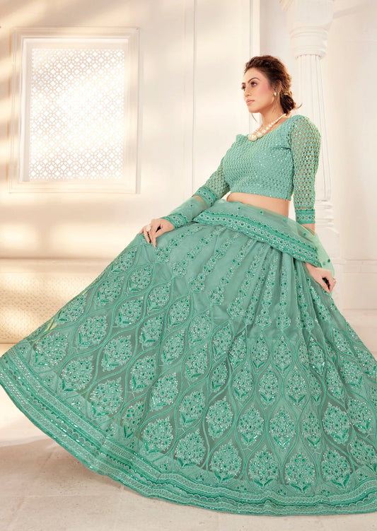 woman standing in Sea Green Bridal Lehenga