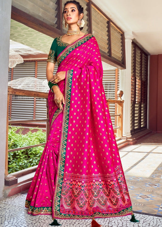 Banarasi dola silk cheshire pink saree in usa with embroidered border and green blouse for weddings and festive occasions.