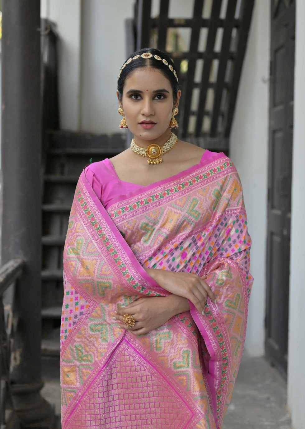 Banarasi patola handloom luxury silk saree designs in light pink colour.
