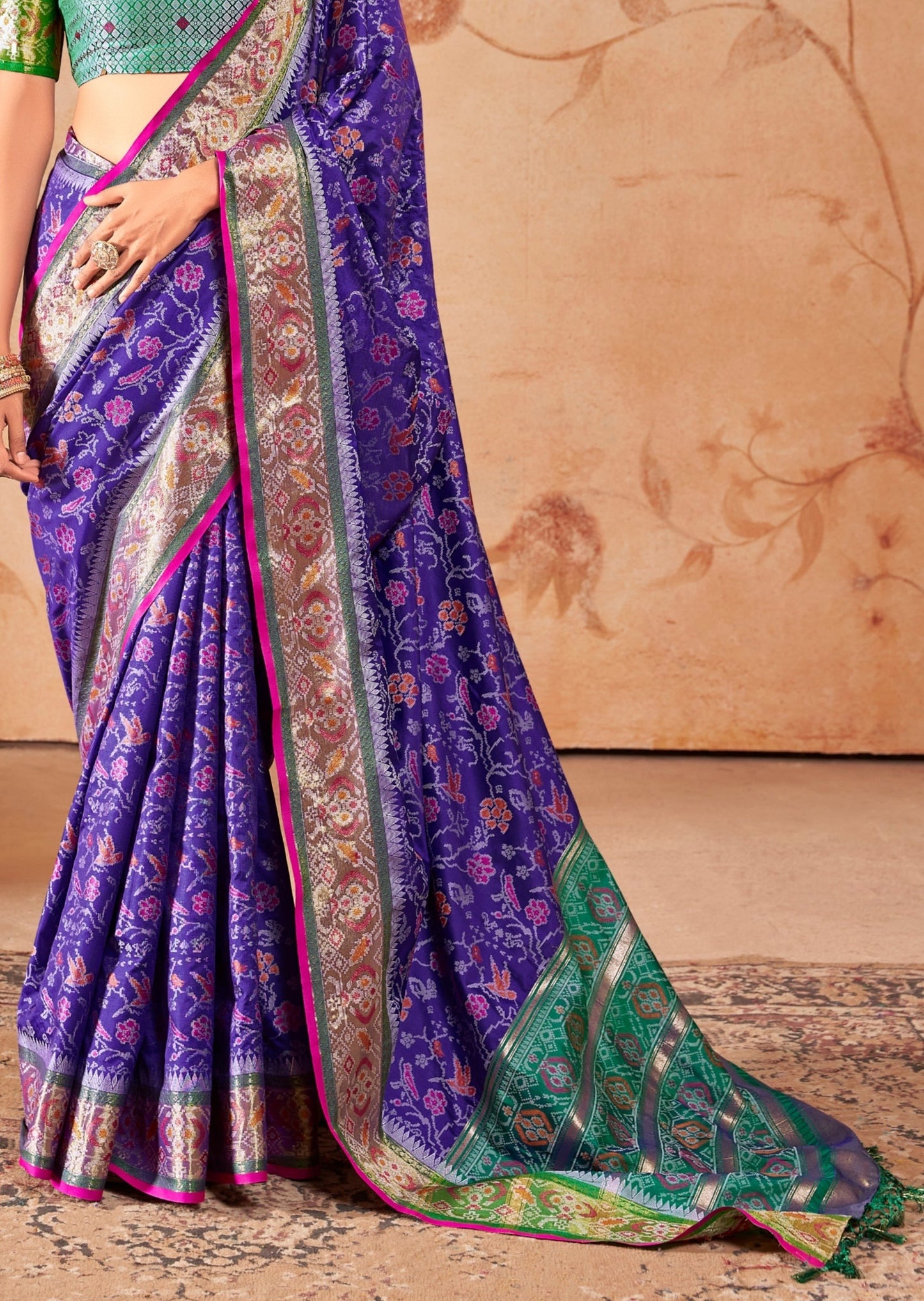 Banarasi patola handloom silk saree usa online designs in violet purple color with green blouse.