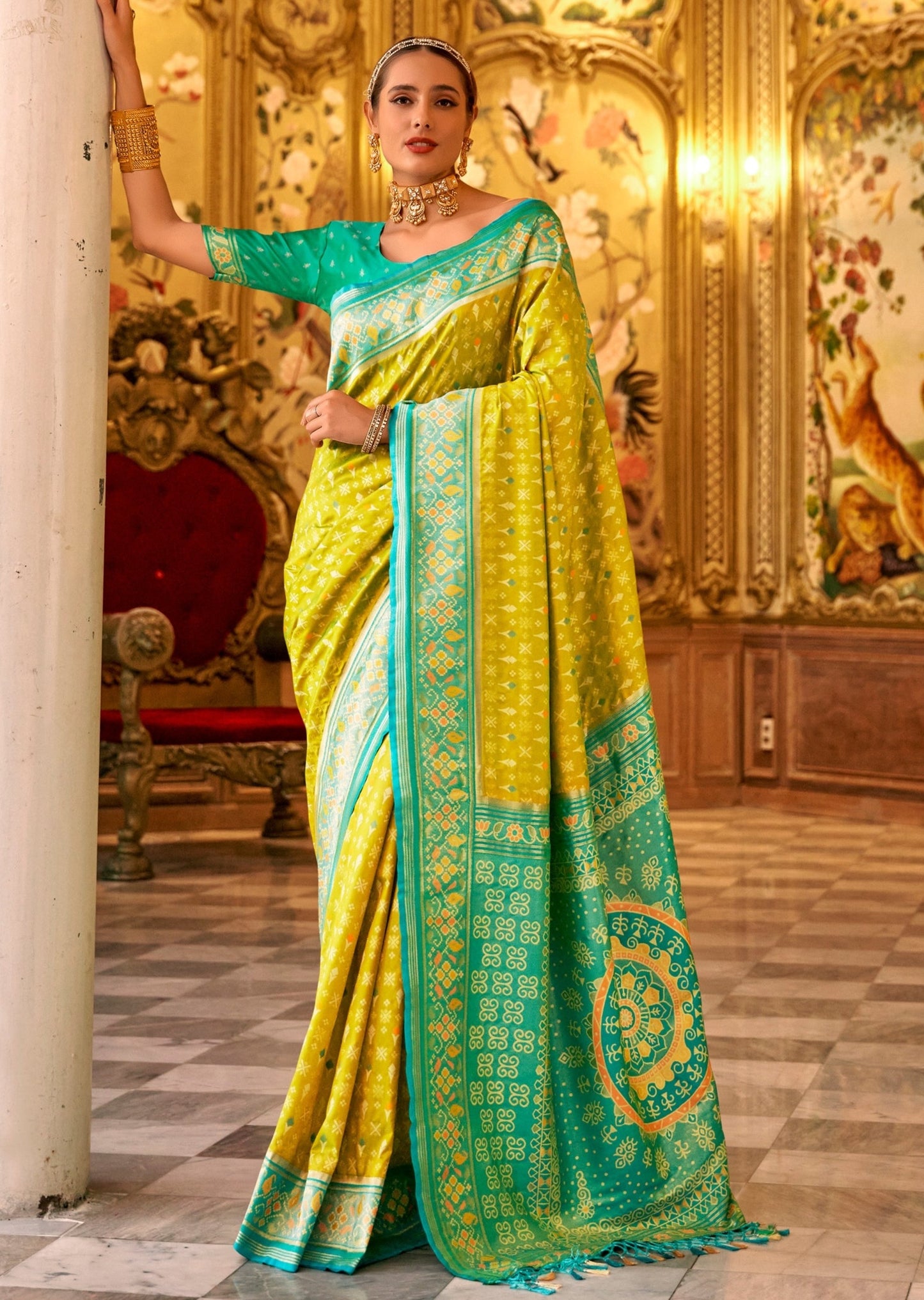 Shop banarasi patola handloom silk saree usa online with price in yellow color with contrast green blouse.