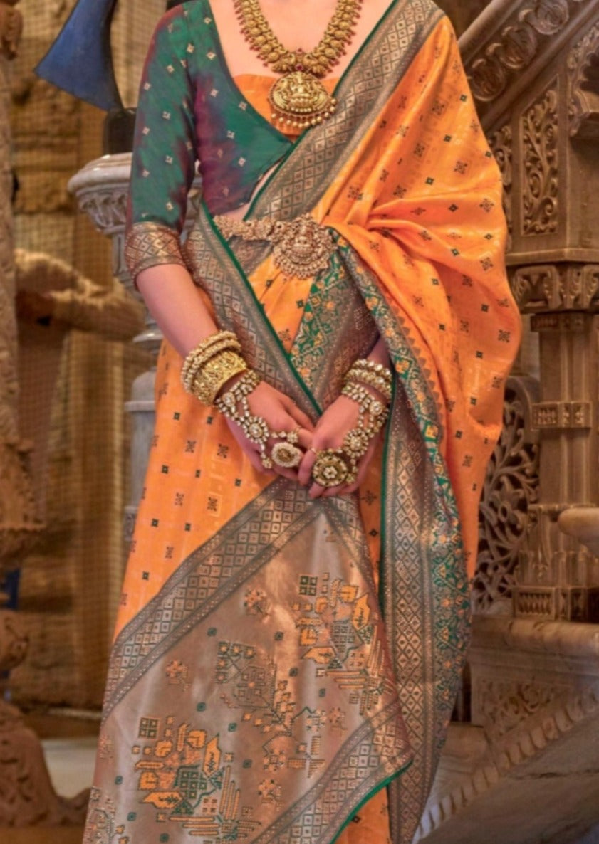 Banarasi patola handloom silk traditional orange saree online for bride.