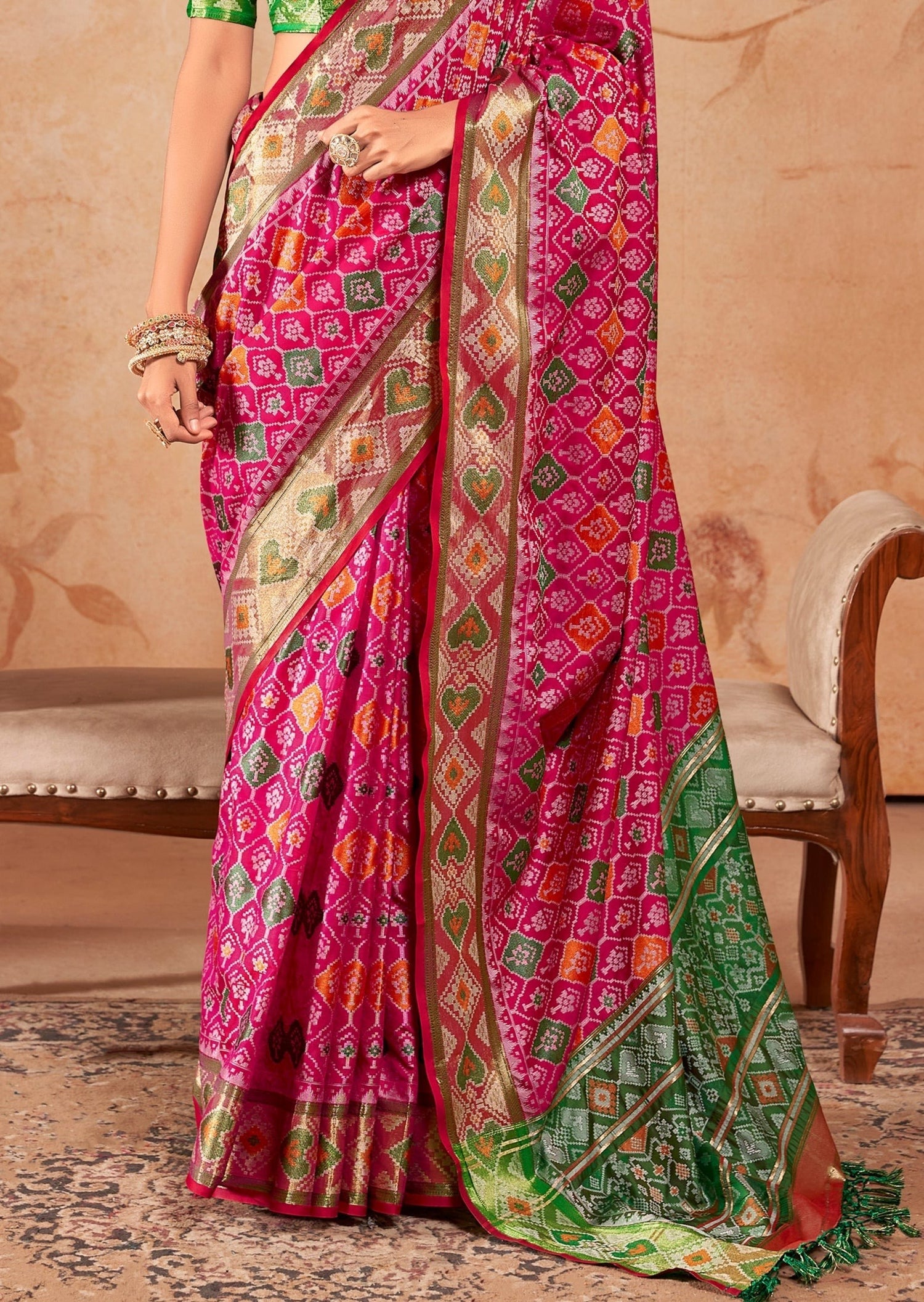 Pink banarasi patola handloom silk saree online designs usa shopping with green blouse for wedding.