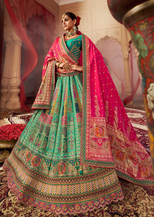 Bride in green banarasi silk lehenga choli with dupatta.