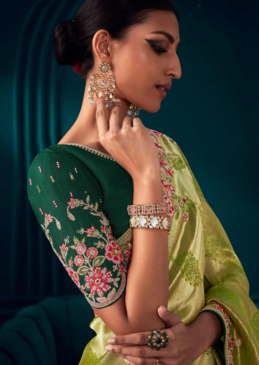 Banarasi silk embroidery work lawn green bridal saree online for bride.