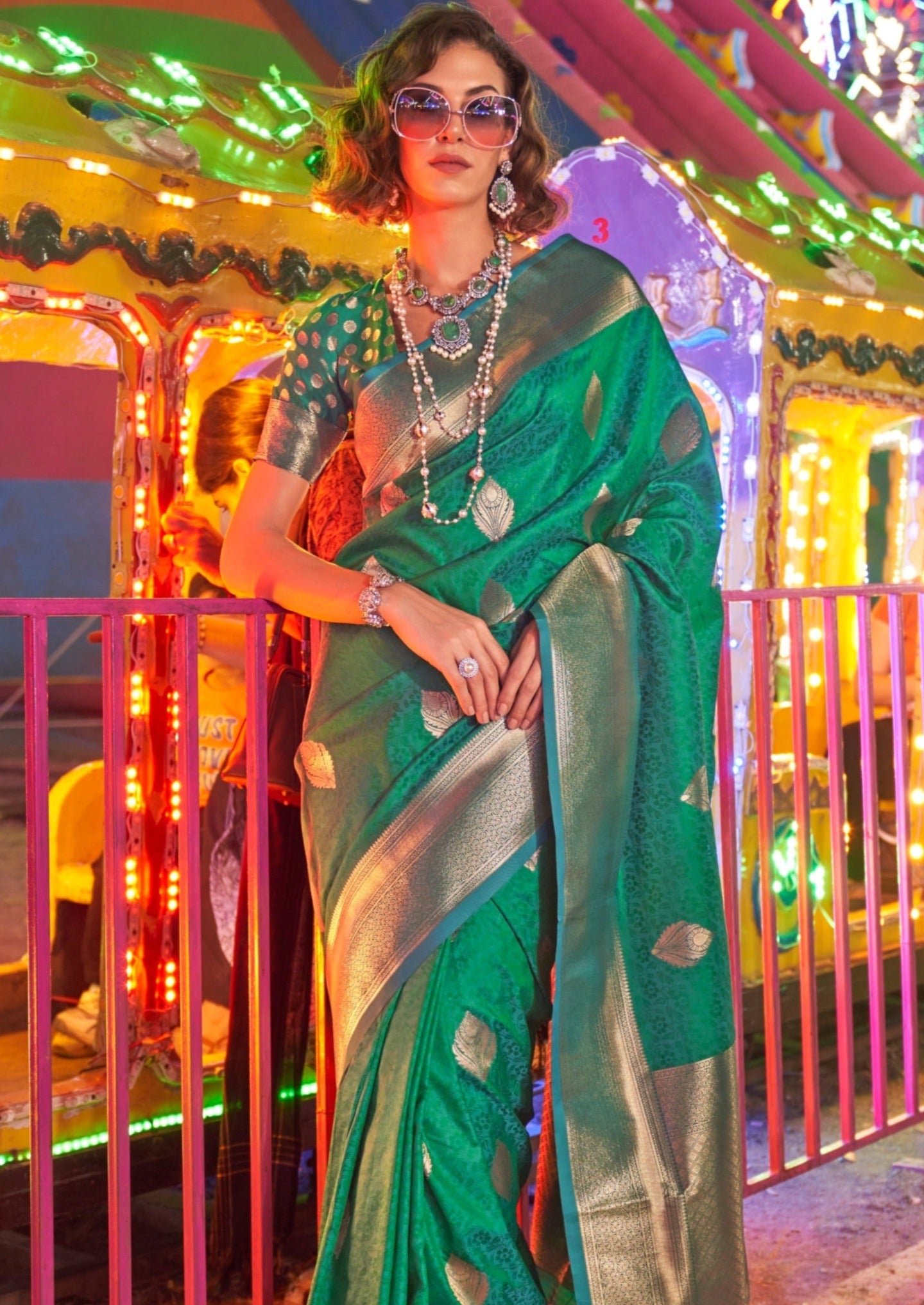 Banarasi silk emerald green handloom saree with golden zari border online price.