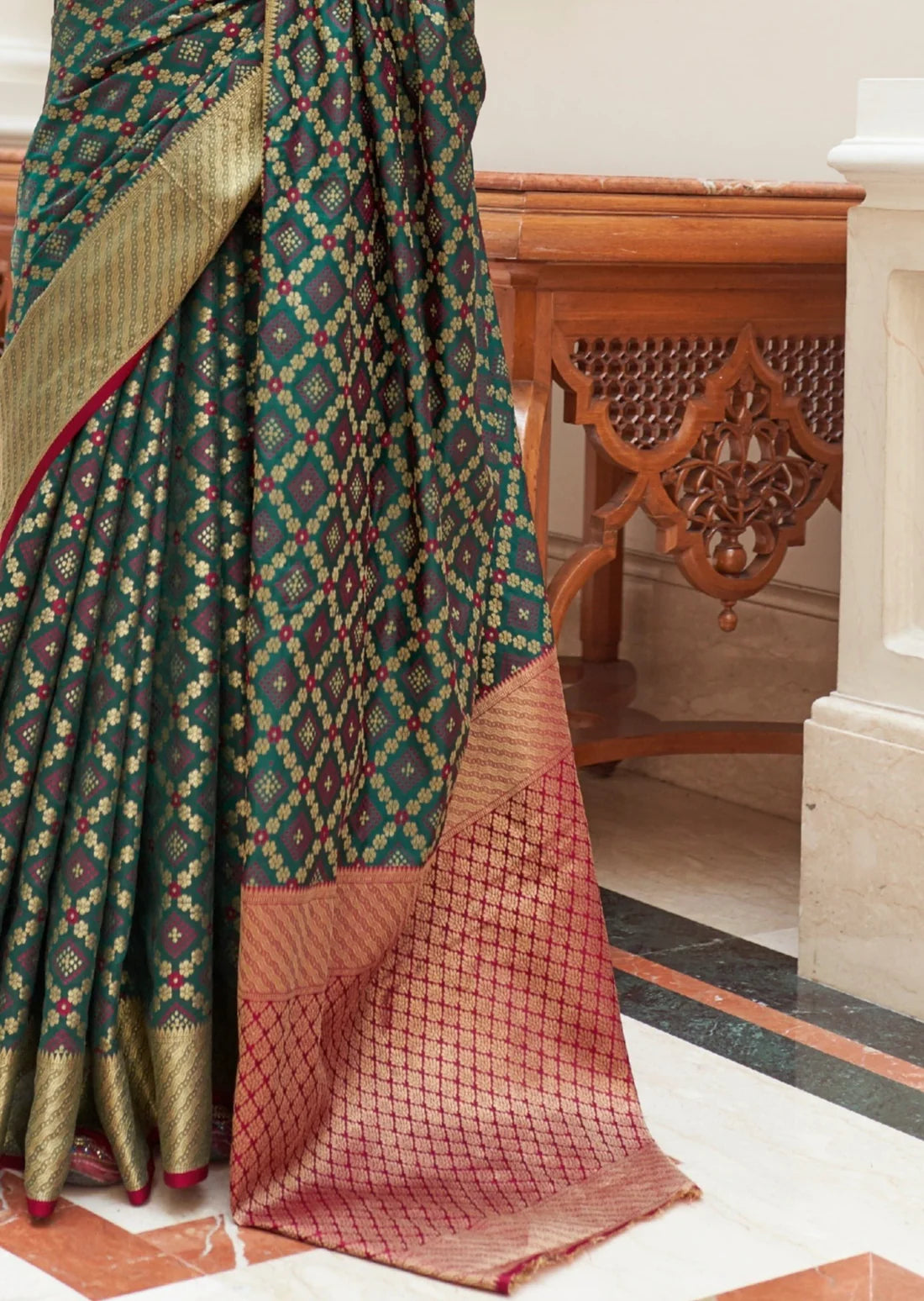Banarasi silk forest green bandhani saree design.