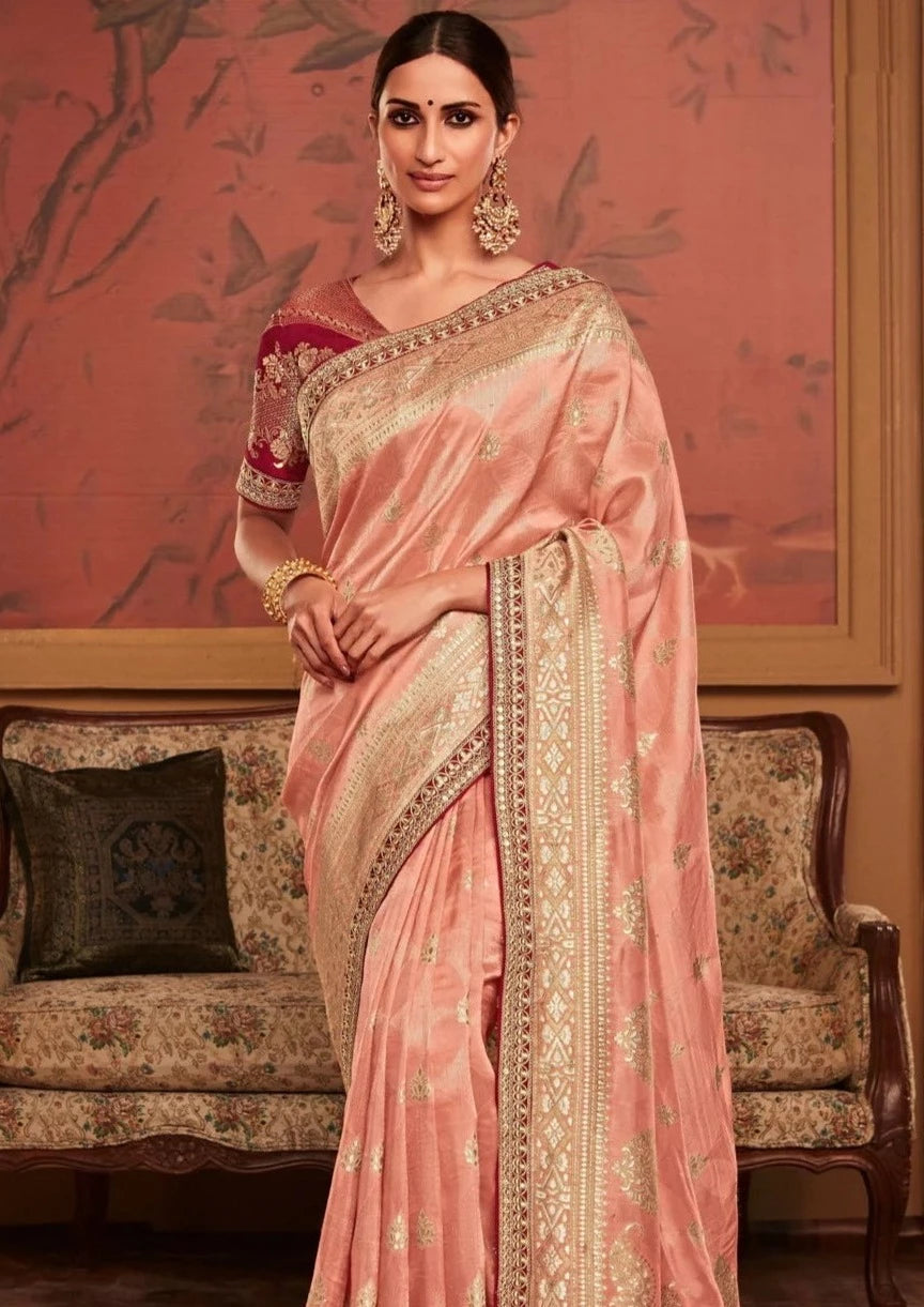 Banarasi silk handwork embroidery peach bridal saree online for party wear.