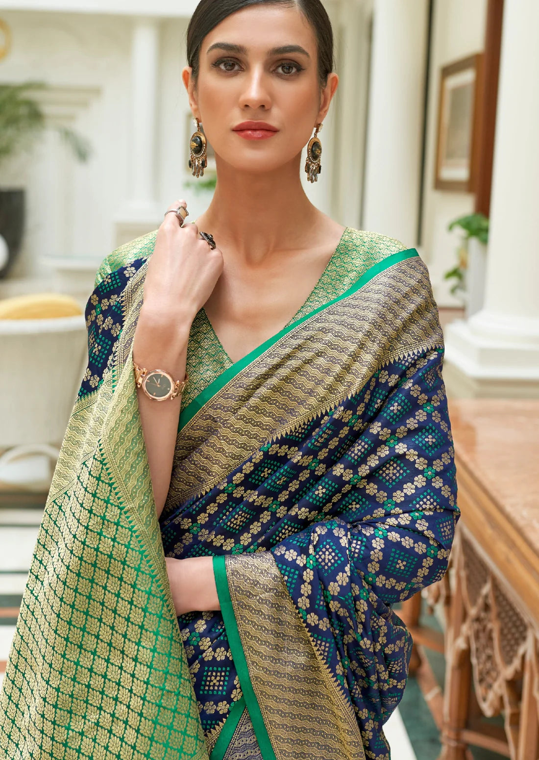Banarasi silk ink blue bandhani saree & contrasting green blouse.