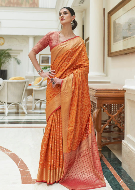 Banarasi silk orange bandhani saree with red blouse online.