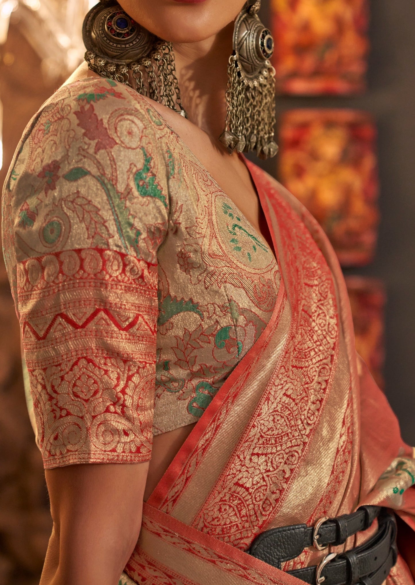 Banarasi silk saree blouse design online in orange color.