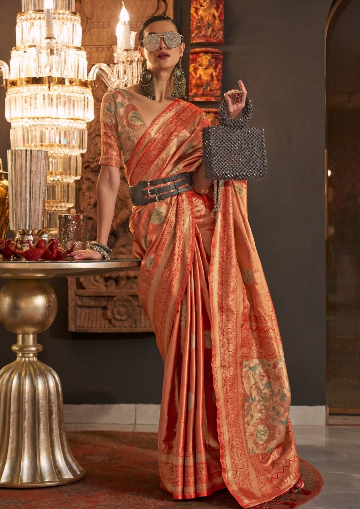 Woman in orange pure banarasi silk handloom saree blouse for sale online.