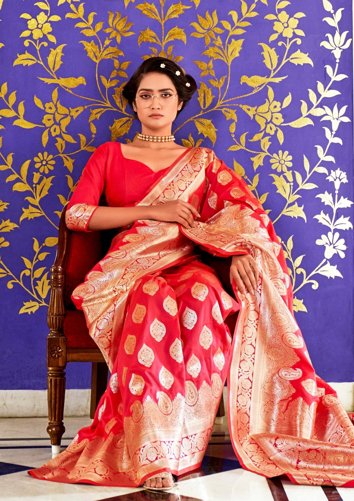 bride sitting in red color banarasi silk saree