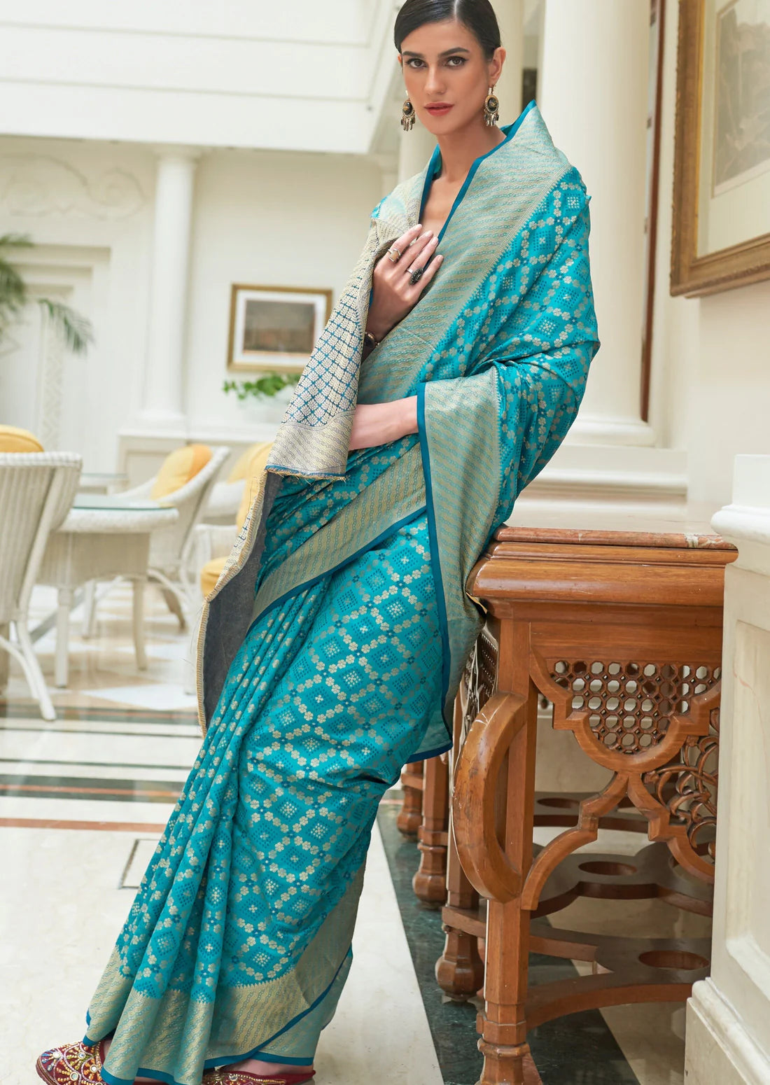 Banarasi silk turquoise blue bandhani saree online.