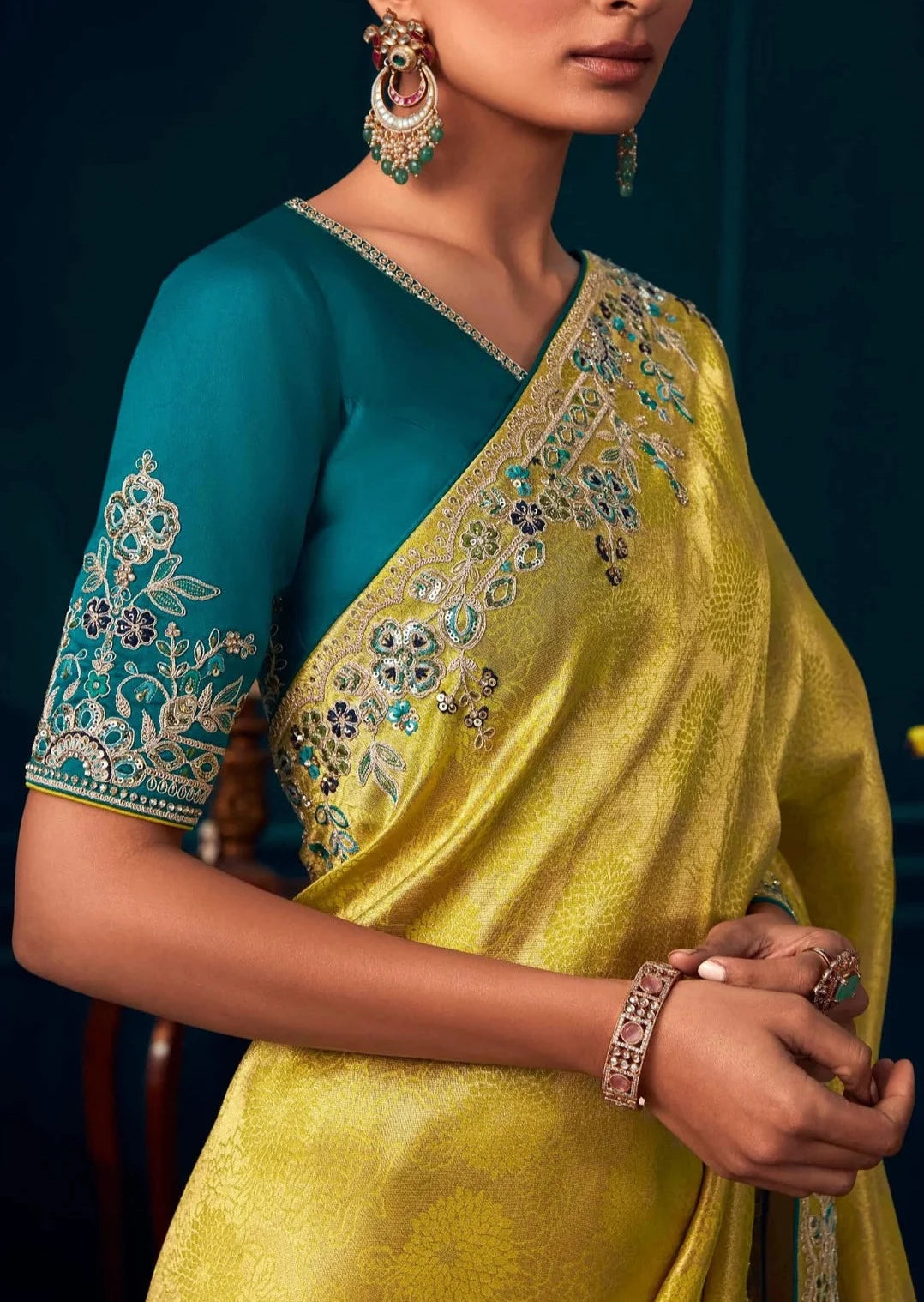 Banarasi silk yellow and blue bridal handwork embroidery saree online for bride haldi ceremony.