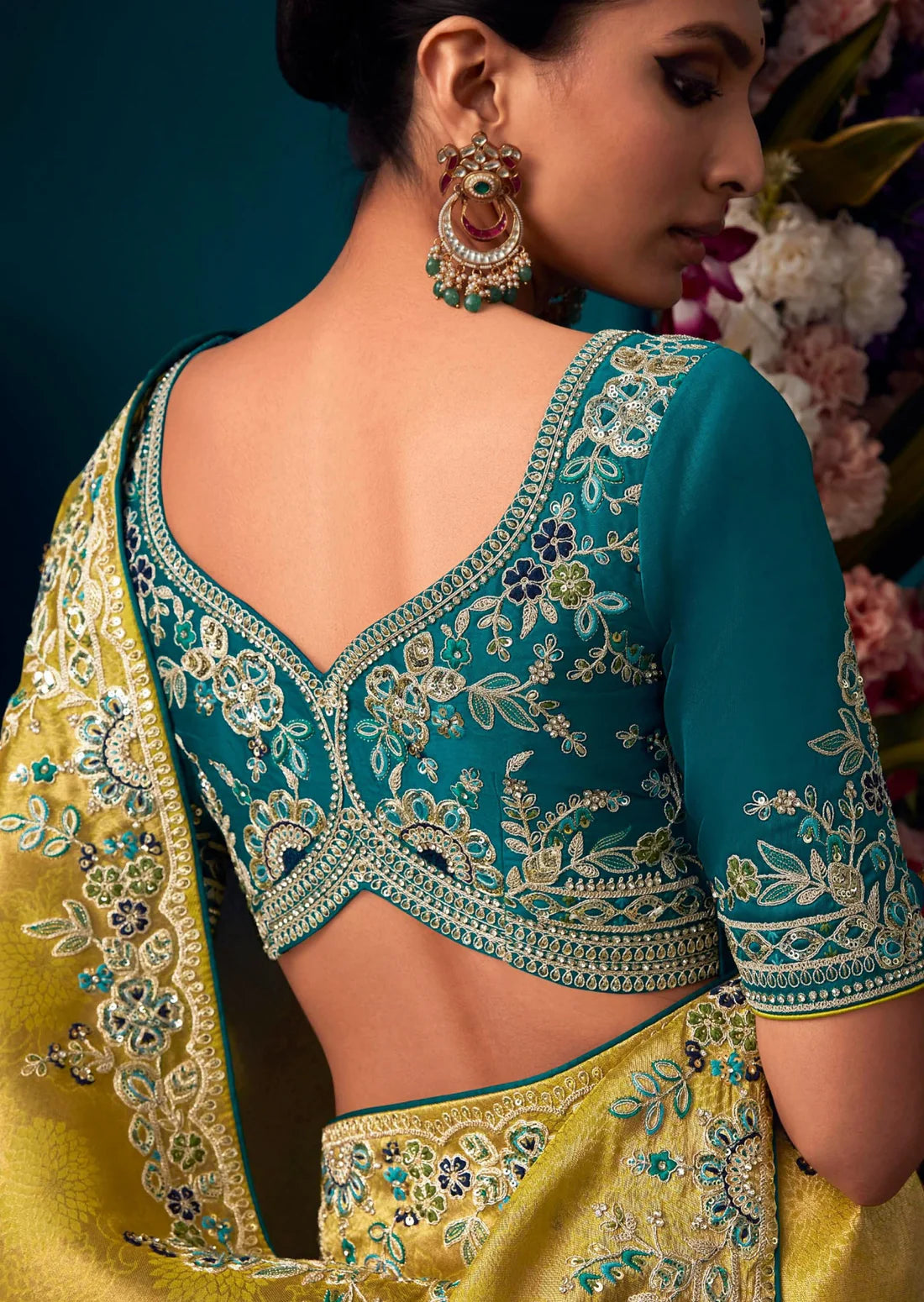 Banarasi silk yellow and blue bridal handwork embroidery saree online for haldi ceremony.