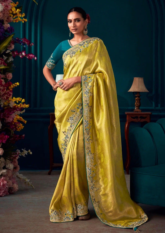 Banarasi silk yellow and blue bridal embroidery saree online for haldi & wedding ceremony.
