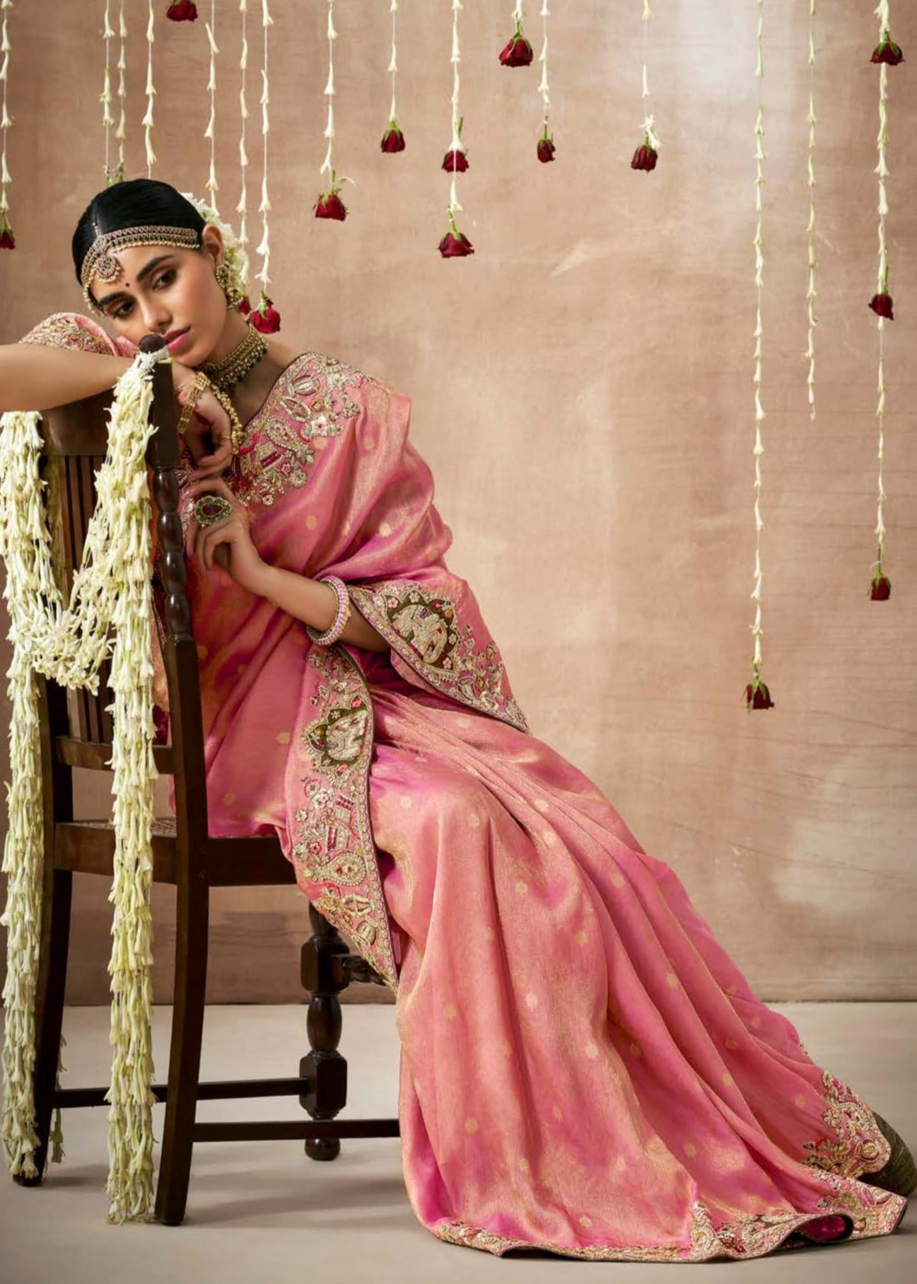 Banarasi tissue silk hand embroidery work pink saree online with contrast mehendi green blouse for bridal look.