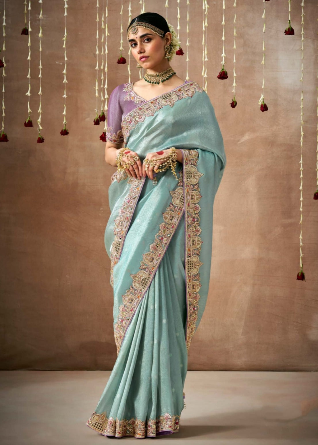 Banarasi tissue silk sky blue saree online india with hand embroidery work.