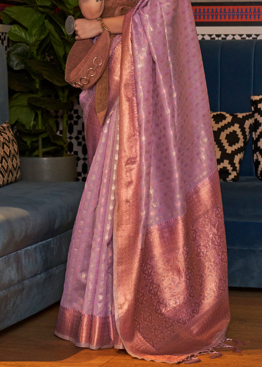 Bridal pastel banarasi tissue silk lilac purple luxury saree pallu with elegant motif work ideal for wedding, reception, festive wear.