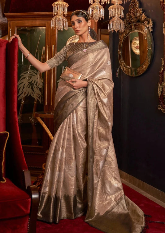Bride in beige and gold contrast kanjivaram silk saree blouse.