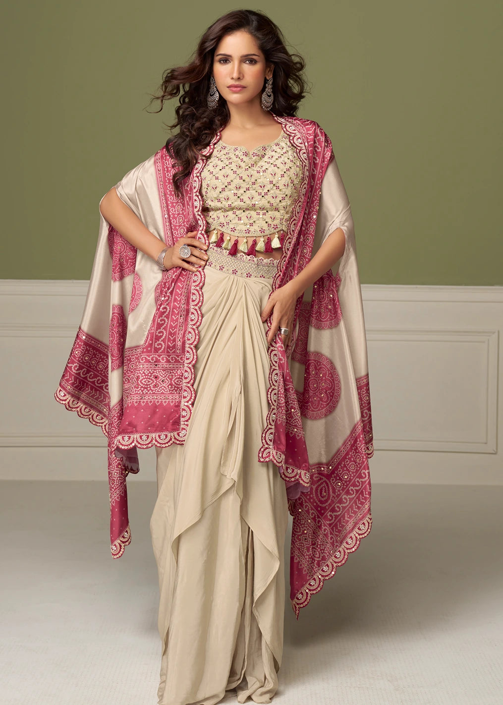 Beige and light pink Indo-Western co-ord set with an embroidered blouse, shrug jacket and dhoti skirt for women, available for shipping to the USA and worldwide.