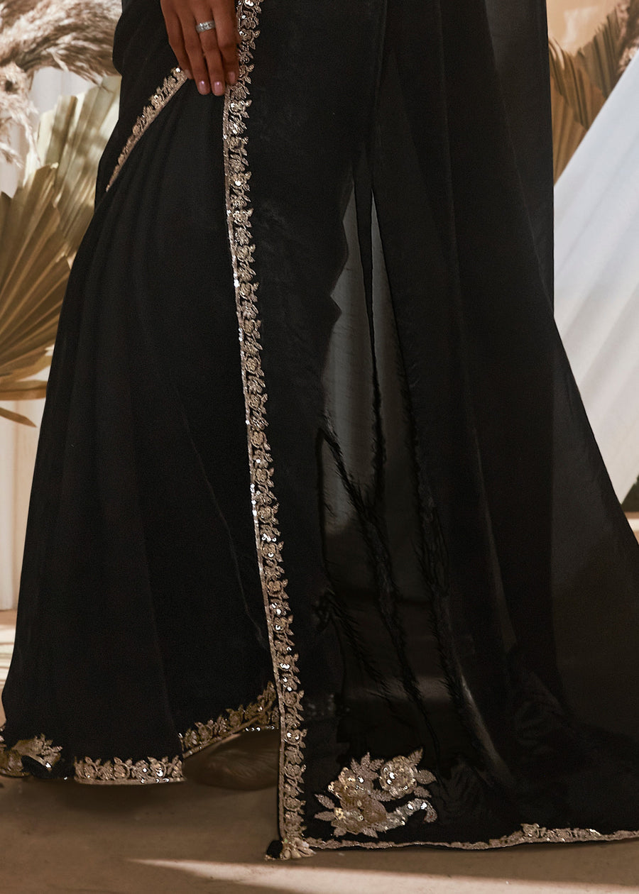 Black organza tissue silk saree in new york usa with delicate embroidery and printed blouse for luxury indian wedding look.