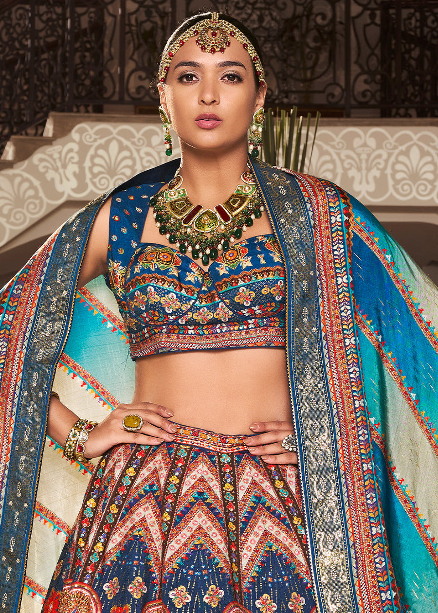 Blue lehenga choli design usa in pure silk fabric for Indian bridal wear.