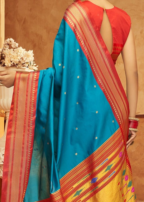 Turquoise blue paithani silk saree with contrast red blouse online shopping india & usa.