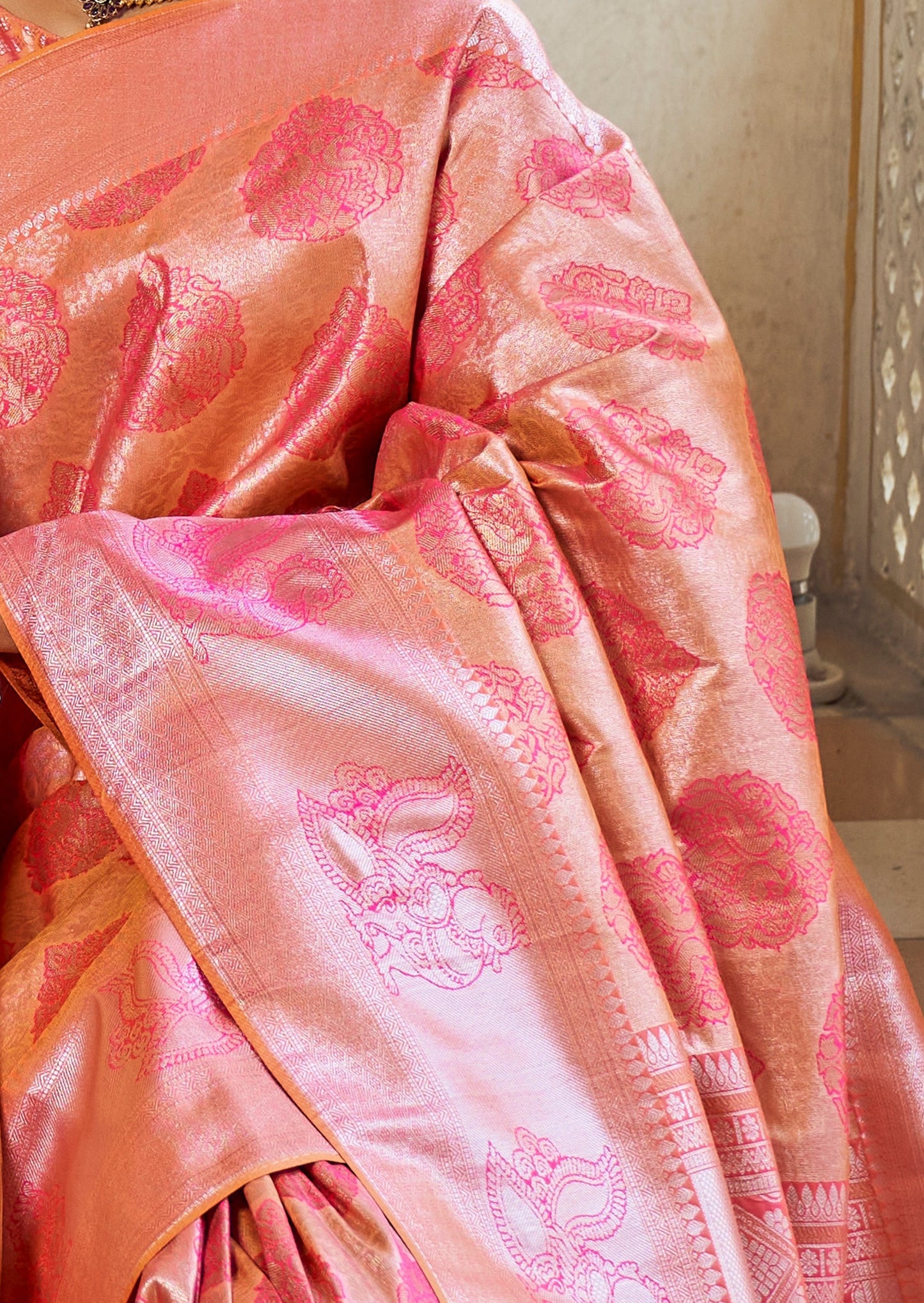 Blush pink kanchipuram silk saree design peacock motif online.